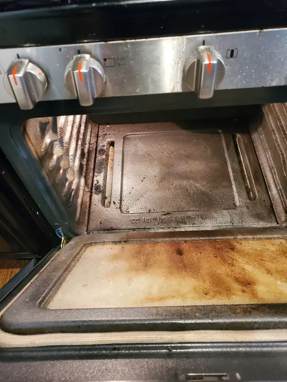 Oven interior before deep cleaning